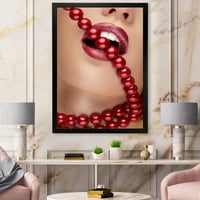 Designart 'Girl száj vörös rúzs harapós piros gyöngyök' Modern keretes művészeti nyomtatás